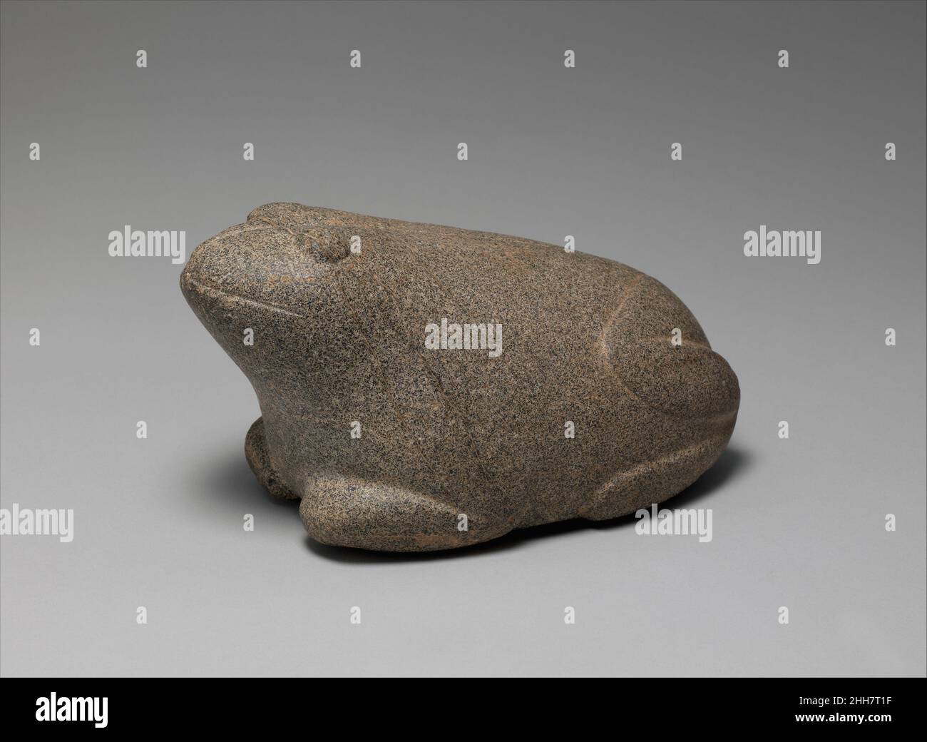 Weight in shape of frog ca. 2000–1600 B.C. Babylonian Zoomorphic weights were widespread in the ancient world. Weights in the shape of frogs and toads were rare in the Near East, but they do occur in Egypt. This frog weight is dated to the second millennium B.C. on the basis of the four line Akkadian inscription under its throat: 'a frog [weighing] 10 minas, a legitimate weight of the god Shamash, belonging to Iddin-Nergal, son of Arkat-ili-damqa.' The mina was the Mesopotamian unit of measure, weighing about 500 grams (18 ounces). The weight system was based on the talent or the average load Stock Photo