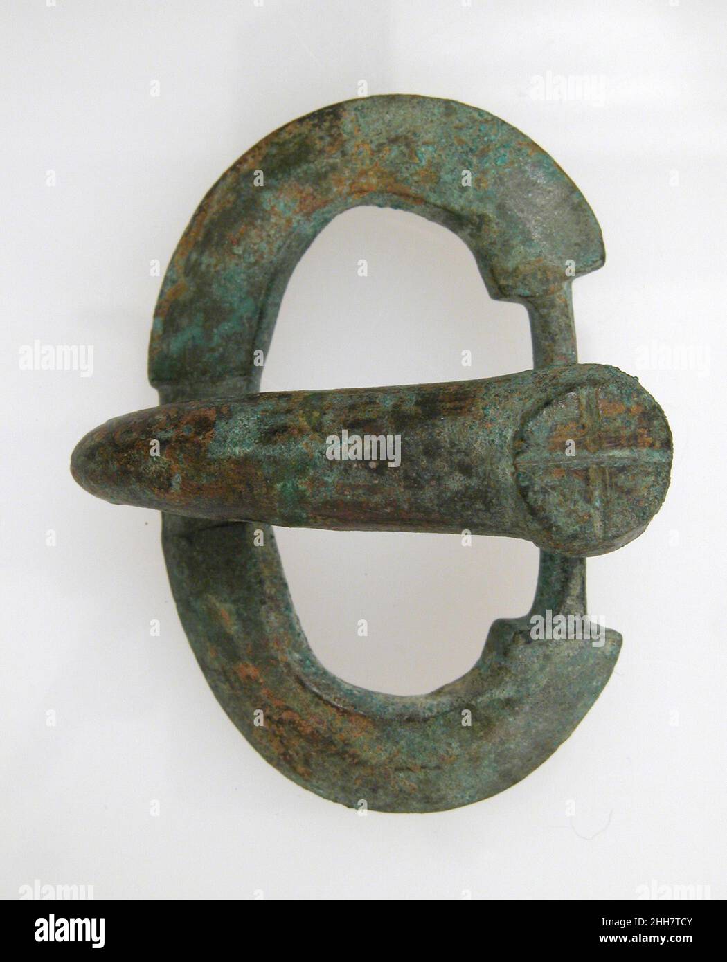 Belt Tongue and Oval Loop from a Buckle 7th Century Frankish. Belt Tongue and Oval Loop from a Buckle. Frankish. 7th Century. Copper alloy. Made in Northern France. Metalwork-Copper alloy Stock Photo