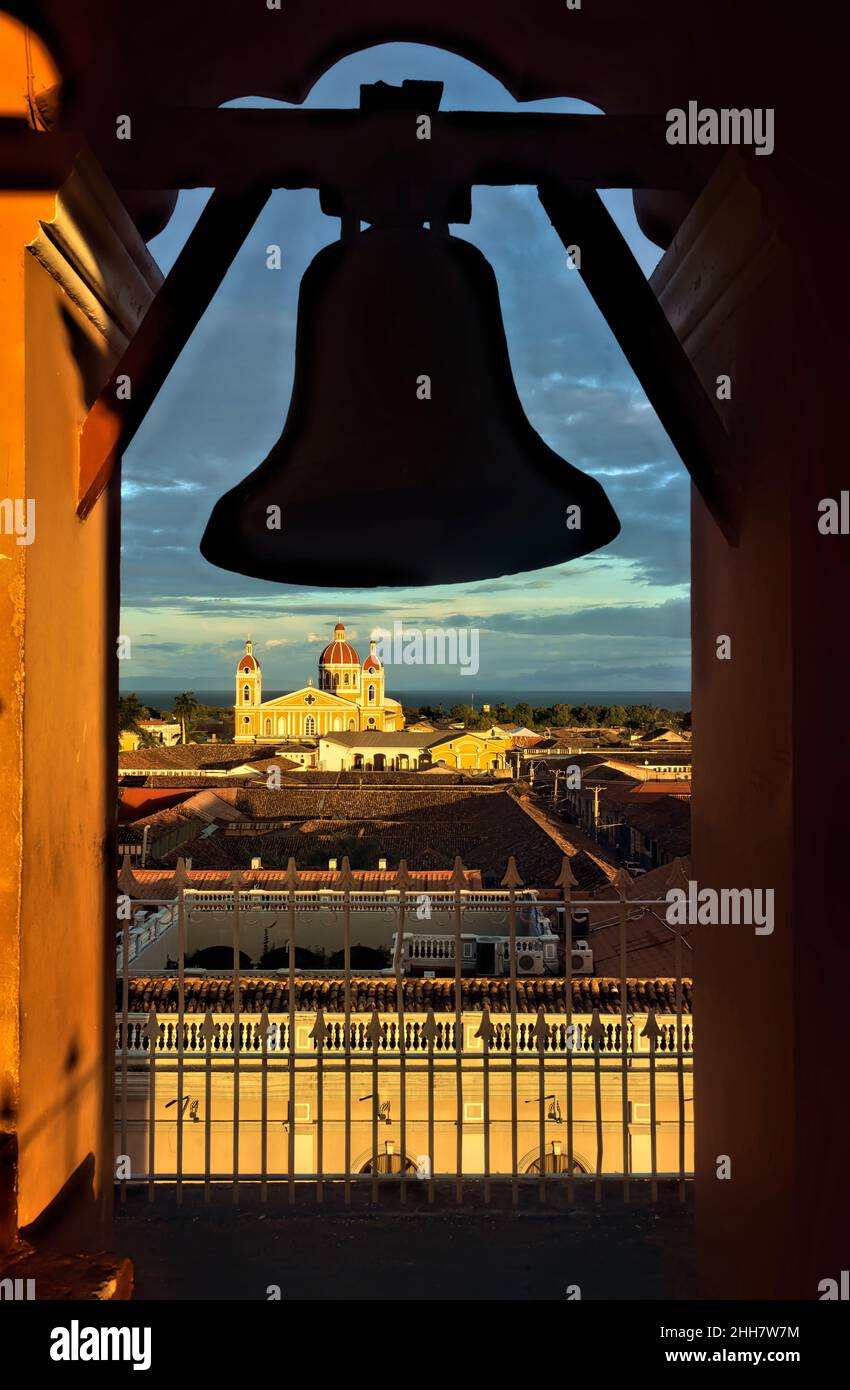 The beautiful neoclassical Granada Cathedral and bell tower of La Merced church, Granada, Nicaragua Stock Photo