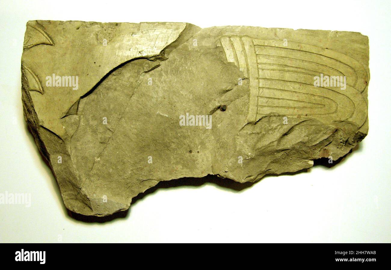 Raised relief fragment 664–610 B.C. Late Period, Saite see 23.3.468. Raised relief fragment. 664–610 B.C.. Limestone, varnish. Late Period, Saite. From Egypt, Upper Egypt, Thebes, Deir el-Bahri, Tomb of Nespekashuty (TT 312, MMA 509), 1st chamber E. wall; 3rd register, MMA excavations, 1922–23. Dynasty 26 Stock Photo