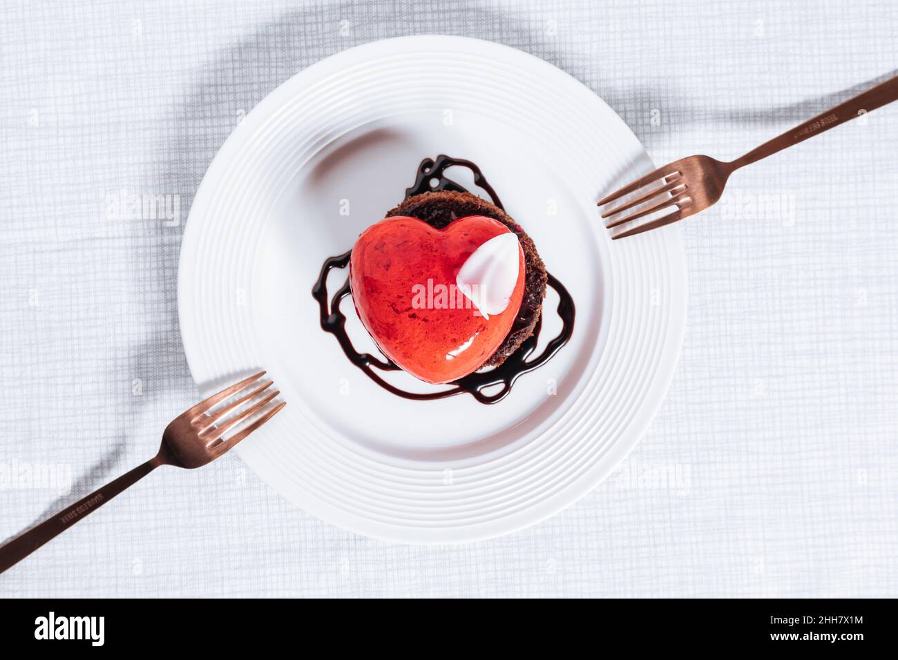 Valentine's day Heart shaped chocolate and strawberry cake. Celebration of love concept. Stock Photo