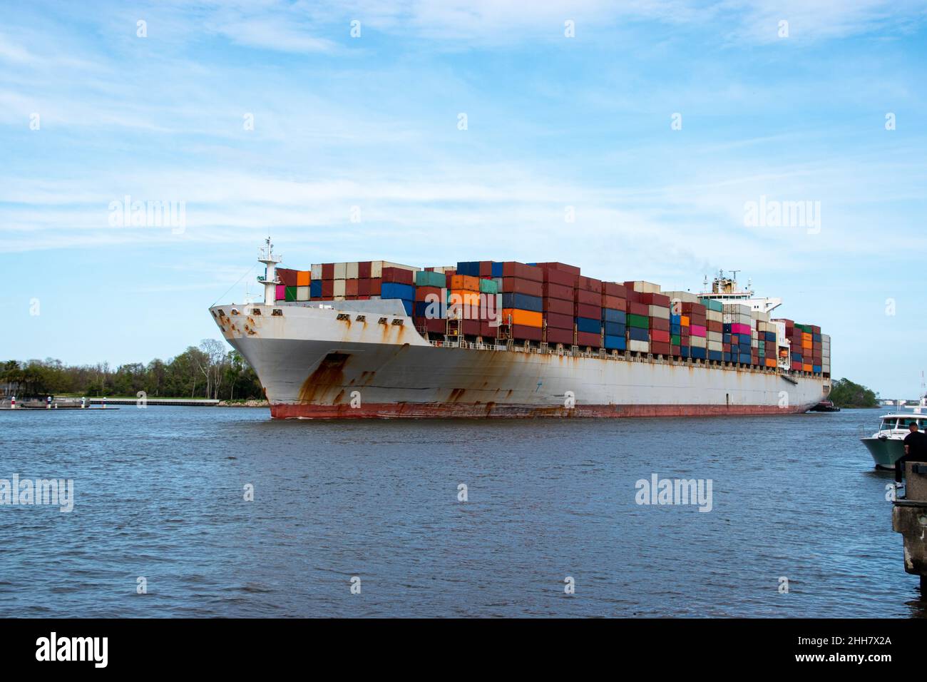 A large container ship sailing into the port of Savannah, GA Stock ...
