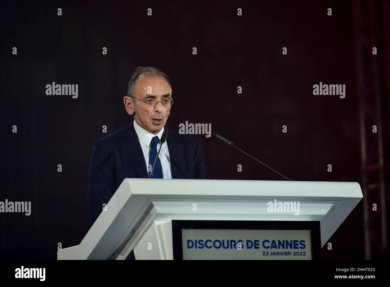 Cannes, France. 22nd Jan, 2022. Eric Zemmour seen on stage delivering his speech at the meeting.Eric Zemmour held an election campaign meeting at the Palais des Libertes in Cannes, during which he presented the new figures of the right who have joined his party called 'reconquete! He insisted in his will to make the union of the right, the only way he says to win the elections and promises that new members of other right-wing parties will join his political movement. (Photo by Laurent Coust/SOPA Images/Sipa USA) Credit: Sipa USA/Alamy Live News Stock Photo