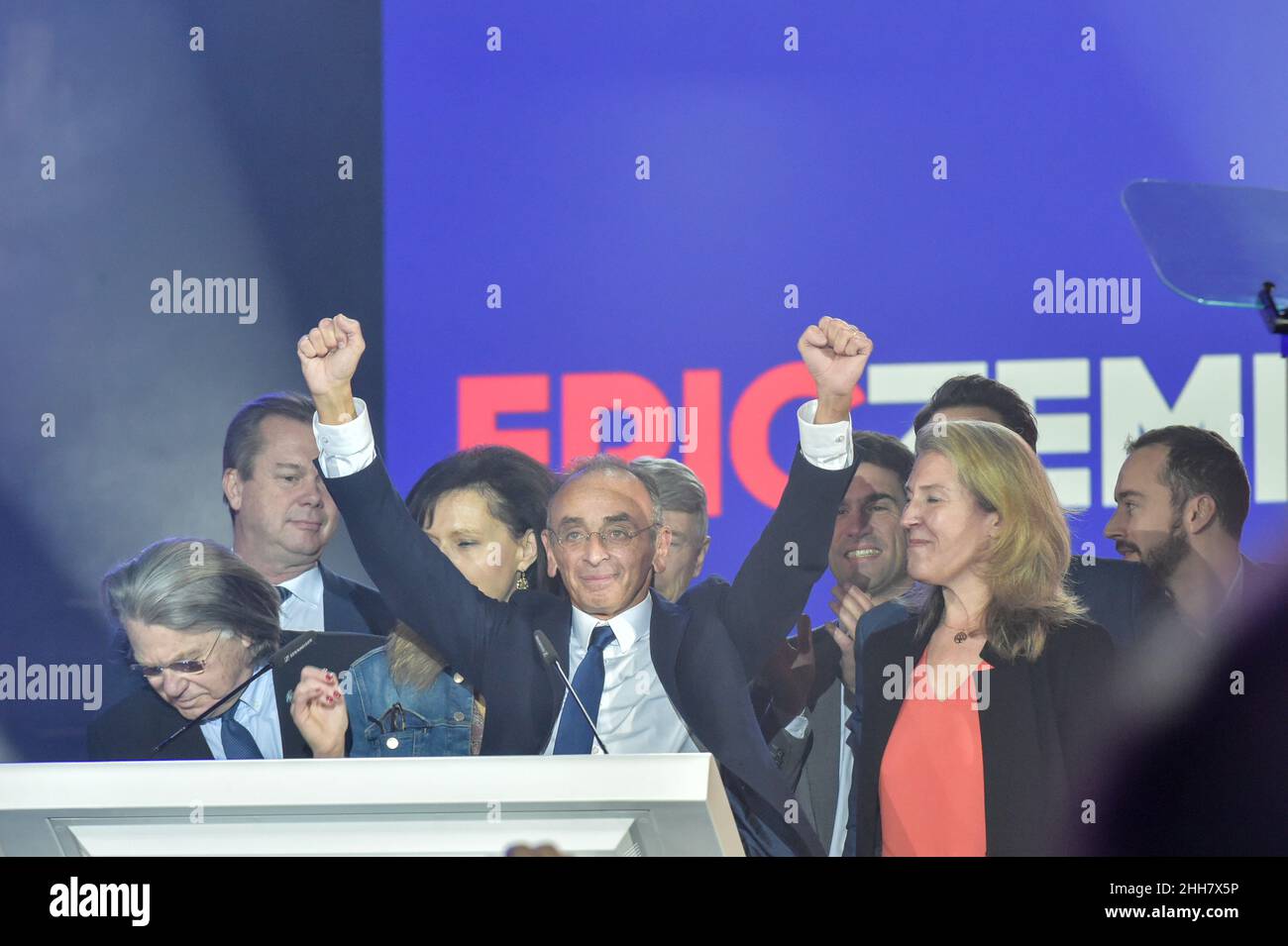 Cannes, France. 22nd Jan, 2022. Eric Zemmour seen raising his arms as he arrives on stage with his team at the Cannes meeting.Eric Zemmour held an election campaign meeting at the Palais des Libertes in Cannes, during which he presented the new figures of the right who have joined his party called 'reconquete! He insisted in his will to make the union of the right, the only way he says to win the elections and promises that new members of other right-wing parties will join his political movement. (Photo by Laurent Coust/SOPA Images/Sipa USA) Credit: Sipa USA/Alamy Live News Stock Photo