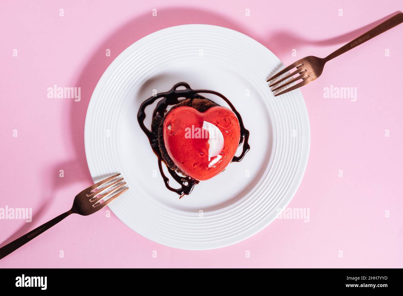 Valentine's day Heart shaped chocolate and strawberry cake. Celebration of love concept. Stock Photo