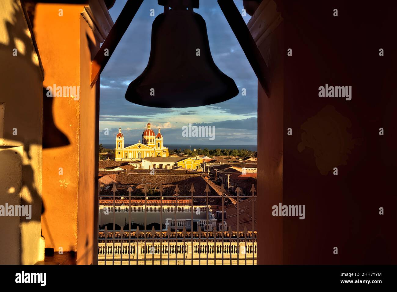 The beautiful neoclassical Granada Cathedral and bell tower of La Merced church, Granada, Nicaragua Stock Photo