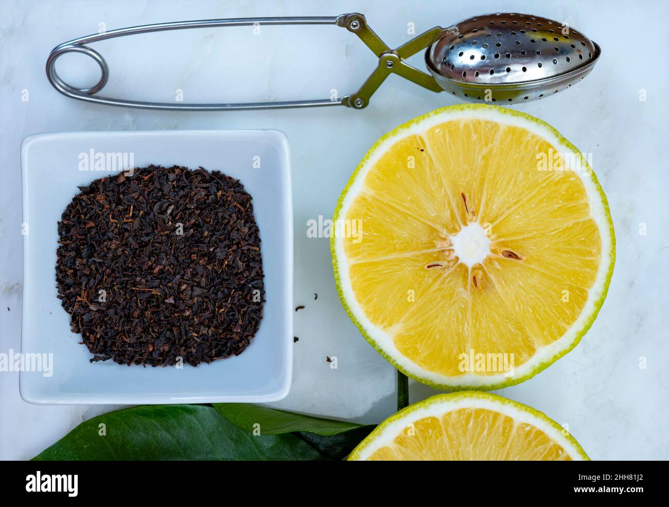 Making of tasty aromatic earlgray tea with fresh ripe bergamot citrus