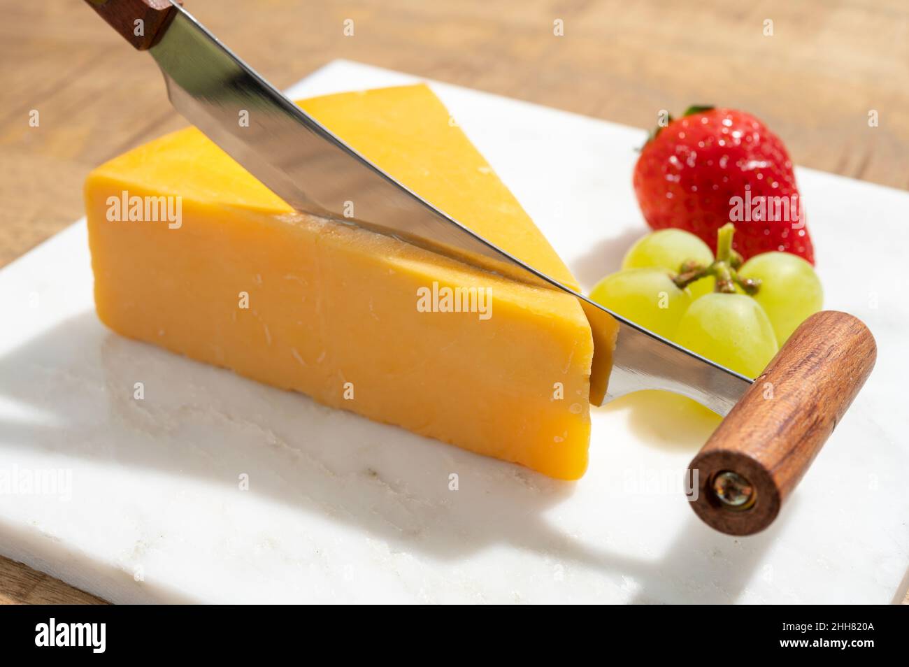 Cheese collection, piece of matured British yellow cheddar cheese made