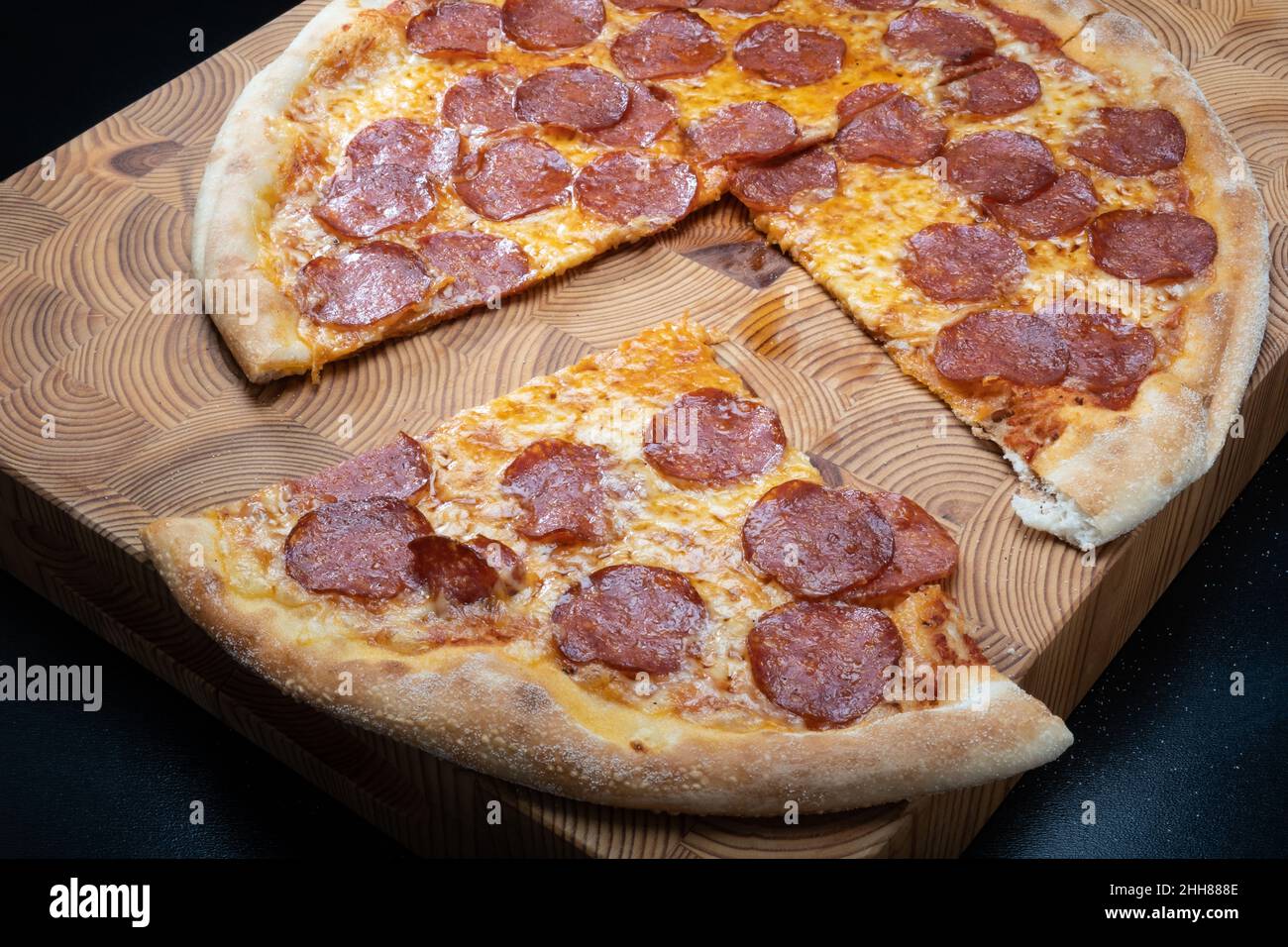 Helsinki / Finland - JANUARY 22, 2022: Closeup of homemade New York style double pepperoni pizza. Stock Photo