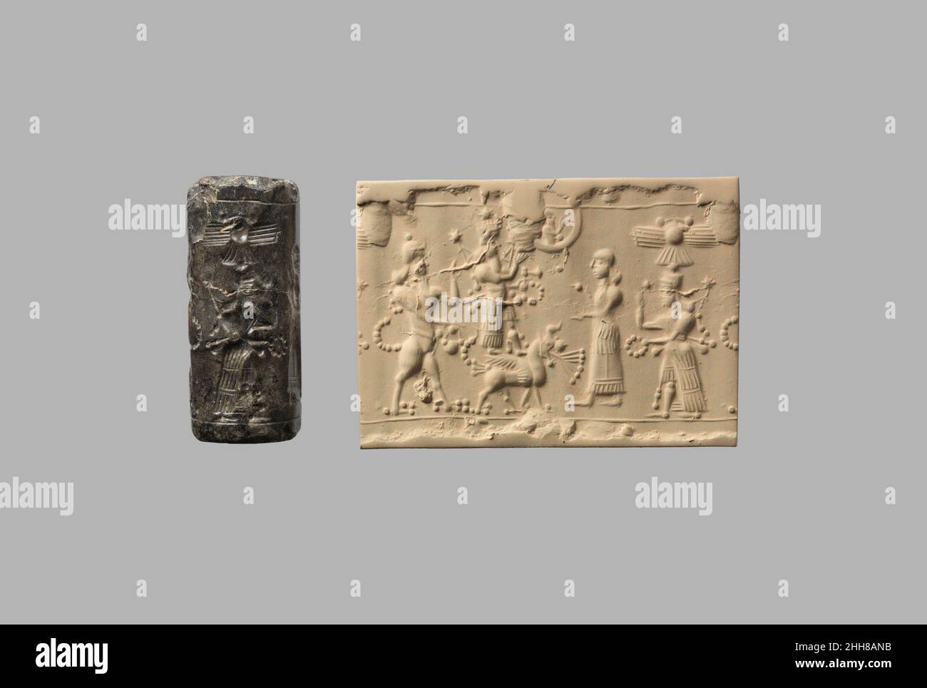 Cylinder seal with cultic scene 8th century B.C. Assyrian Although
