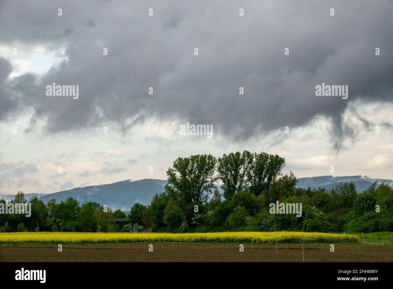Stormy Clouds Over Farm Field Stock Photo - Alamy