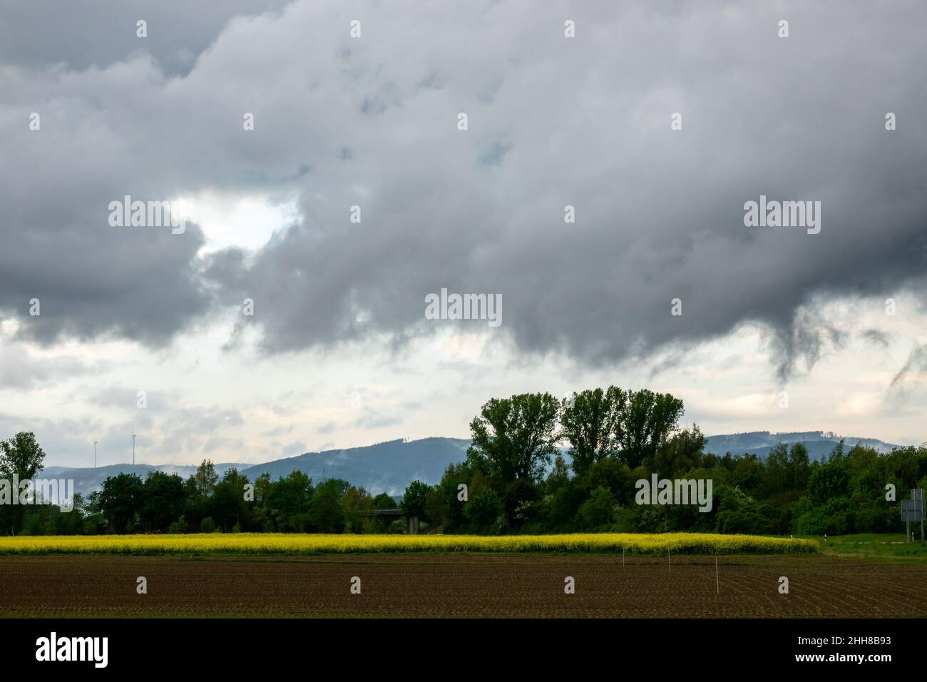 Stormy Clouds Over Farm Field Stock Photo - Alamy
