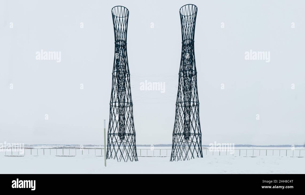 Two Shukhov towers at Strelka in Nizhny Novgorod. On the banks of the Volga and Oka rivers. Historical and cultural value.  Stock Photo