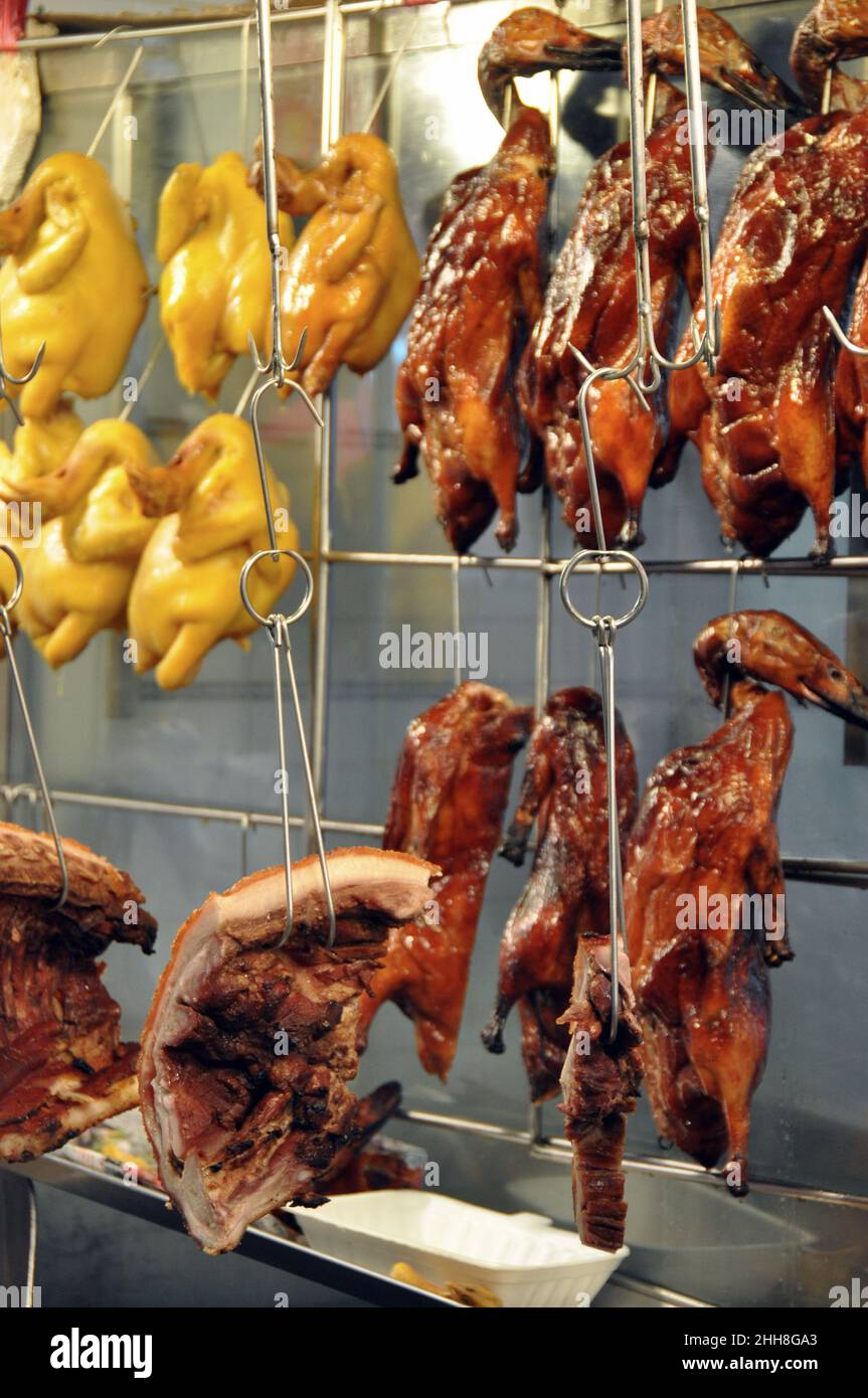 Fresh out of the oven Cantonese roast meats in Tai Po Market 大埔, Hong Kong, China. Stock Photo