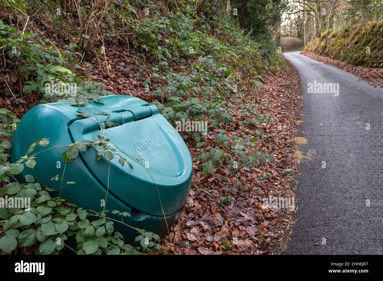 Local council grit and salt bin at side of hill Stock Photo Alamy