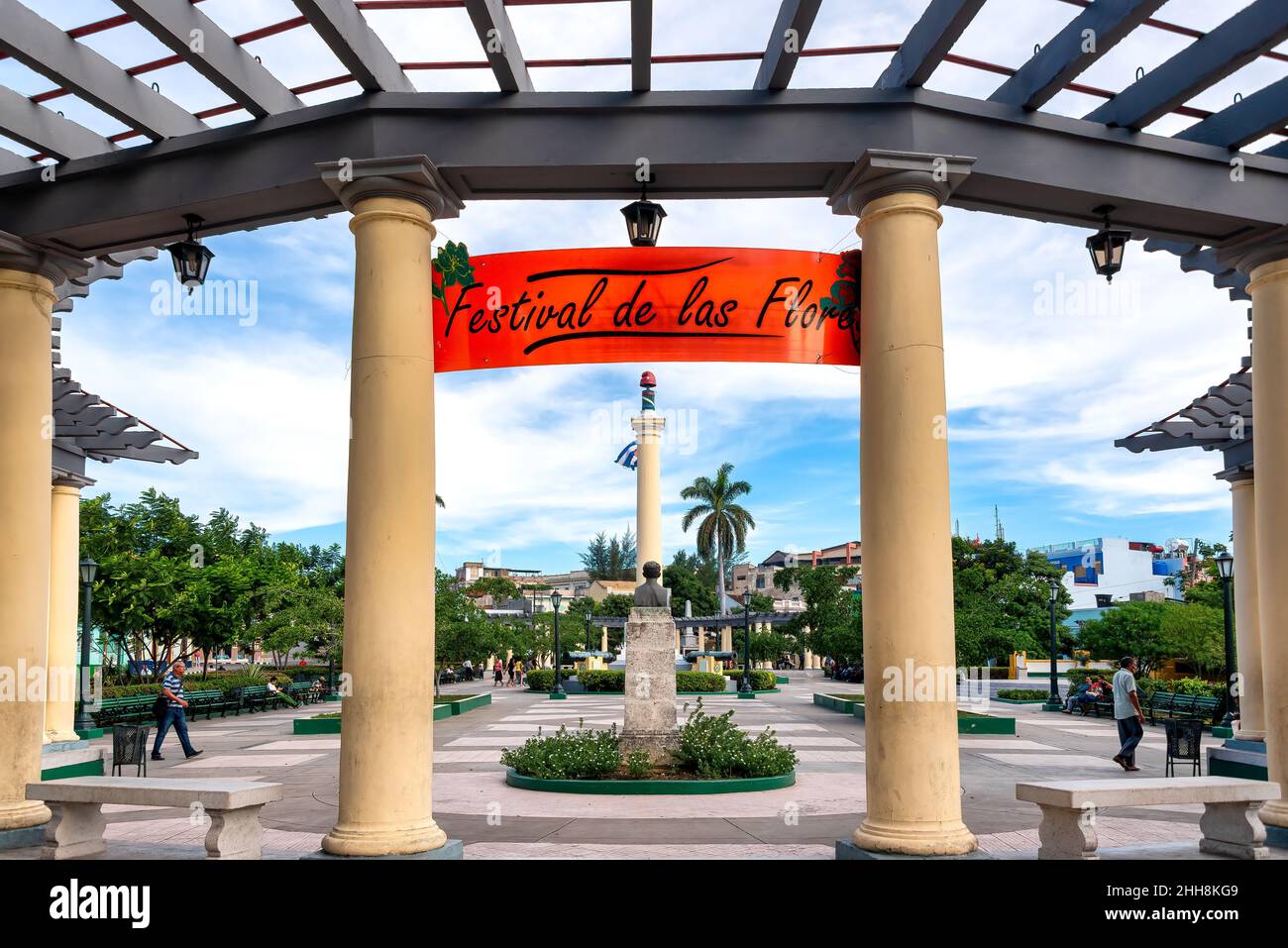 Daytime view of Plaza de Marte in the city center. The famous place is a tourist attraction. There is a sign reading 'Festival de las Flores' (Flowers Stock Photo