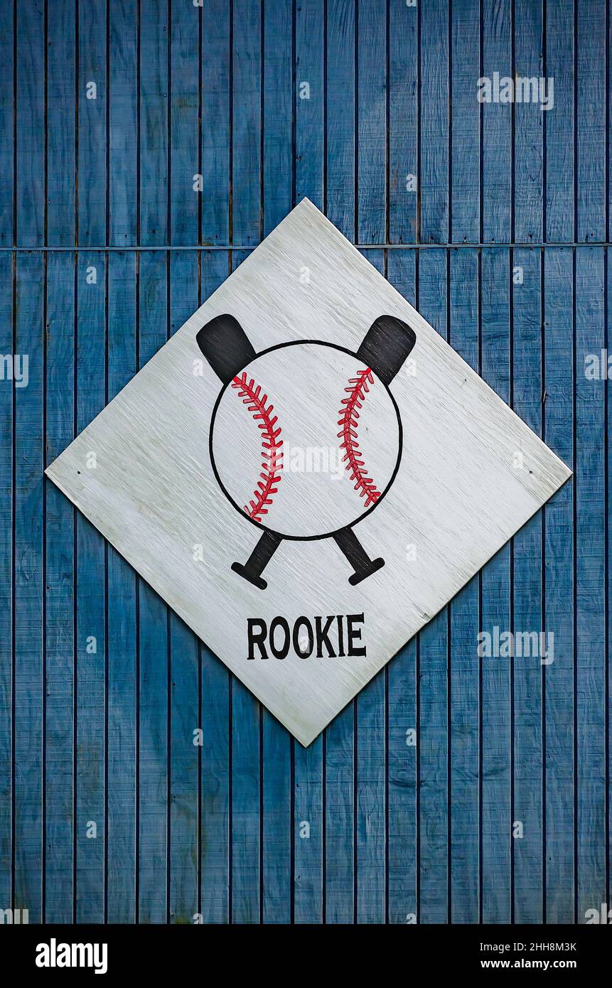 A rookie sign hangs on the wall at a baseball field at Zirlott Park, July 13, 2021, in Bayou La Batre, Alabama. Stock Photo