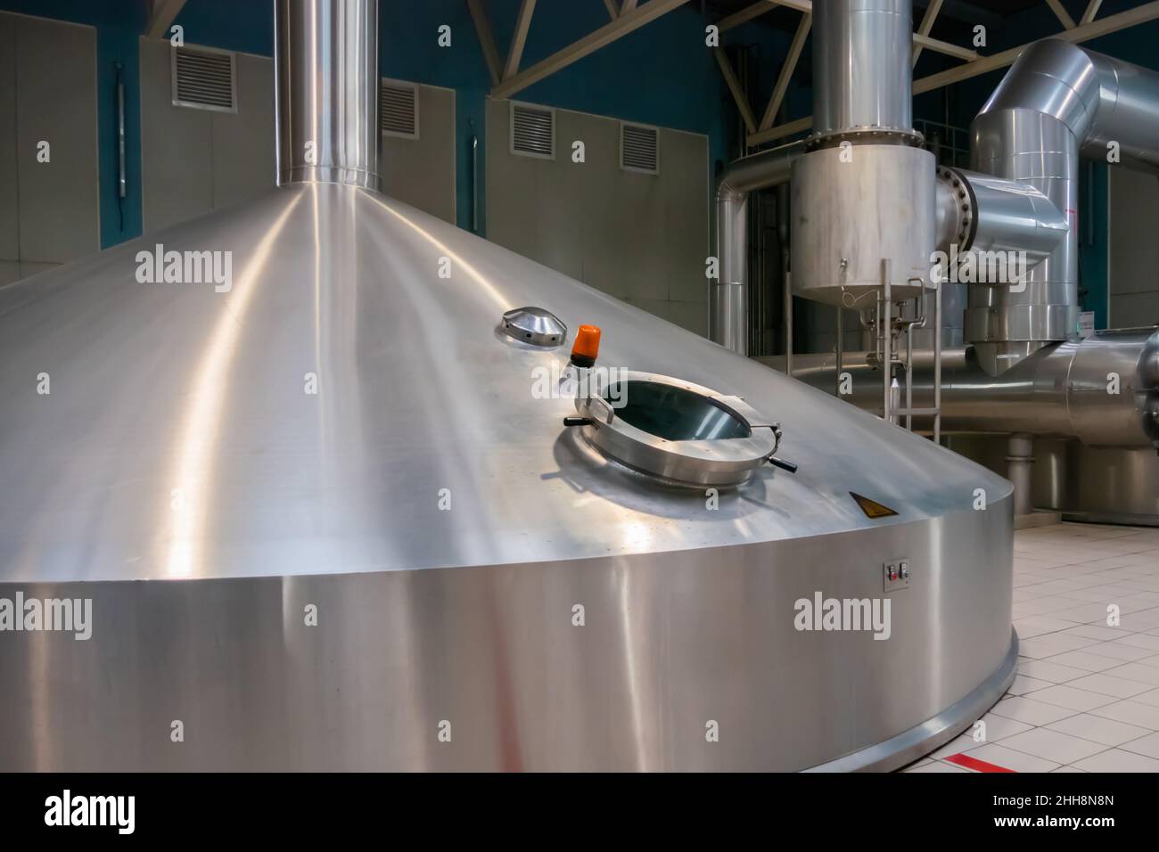 Steel tank for wort boiling at beer factory brewery equipment Stock