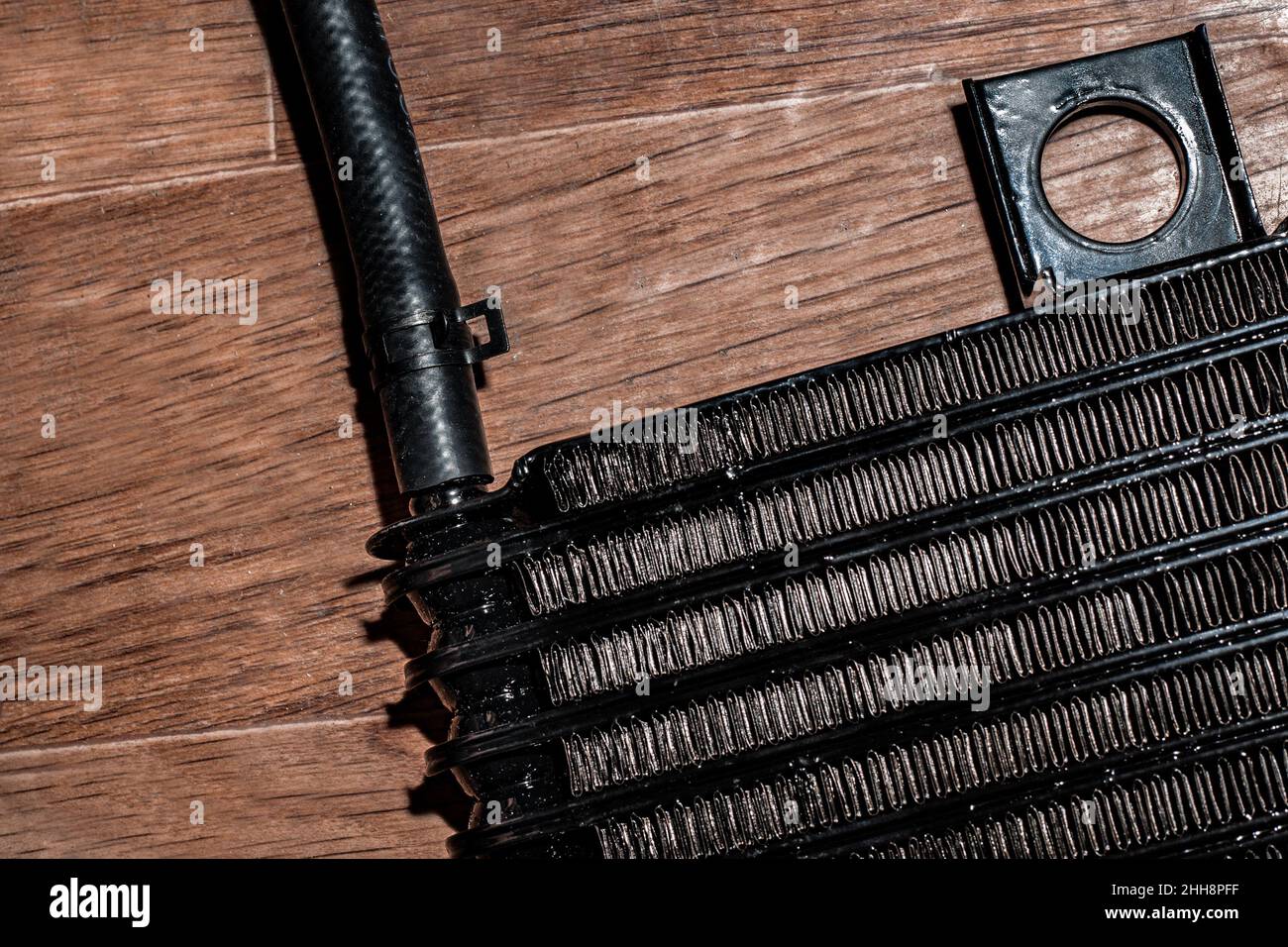 Oil cooler for automatic transmission cooling with oilresistant hose