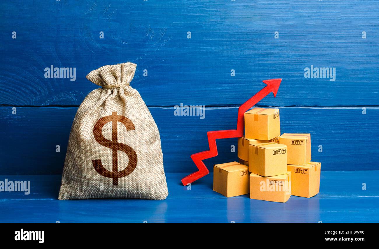 Dollar money bag with boxes and up arrow. Income increase, acceleration and growing of economy. Good consumer sentiment and demand for goods. High sal Stock Photo