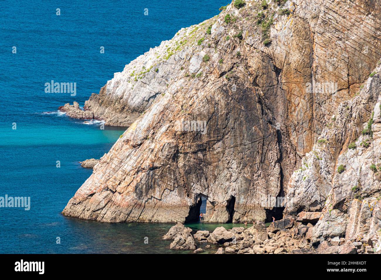 Rocky cliff with arches near Playa del Silencio (Asturias, Spain) Stock Photo