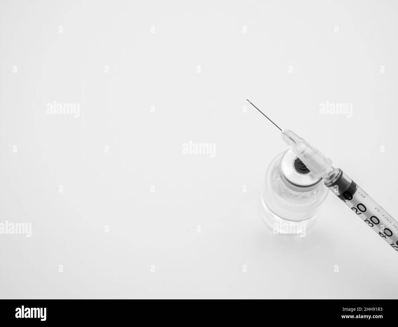 Syringe with small vaccine bottle isolated on white background Stock Photo