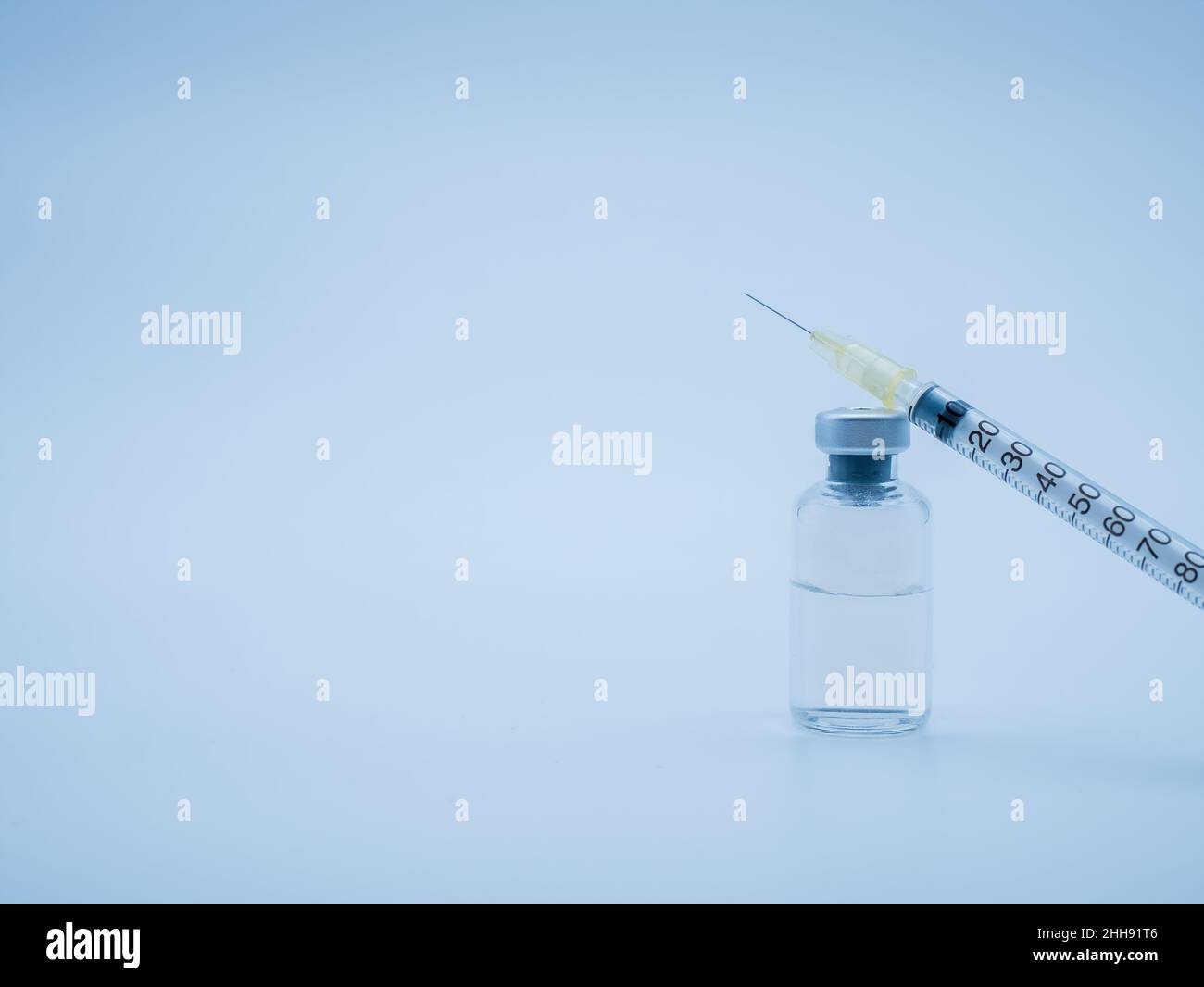 Syringe with small vaccine bottle isolated on white background Stock Photo