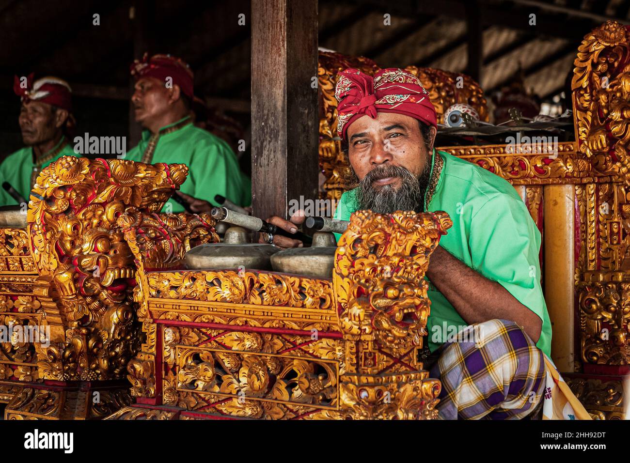 BALI, INDONESIA - MARCH 1, 2014: Portrait of a Balinese man in traditional attire, Bali, Indonesia Stock Photo