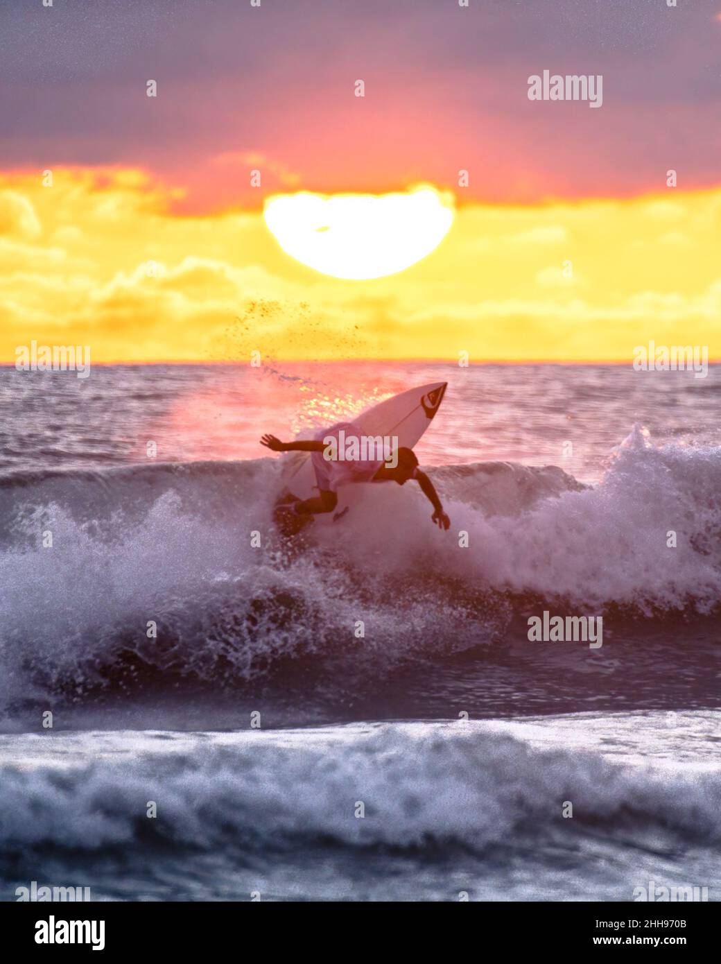 Surfers power turn in Costa Rica Stock Photo - Alamy