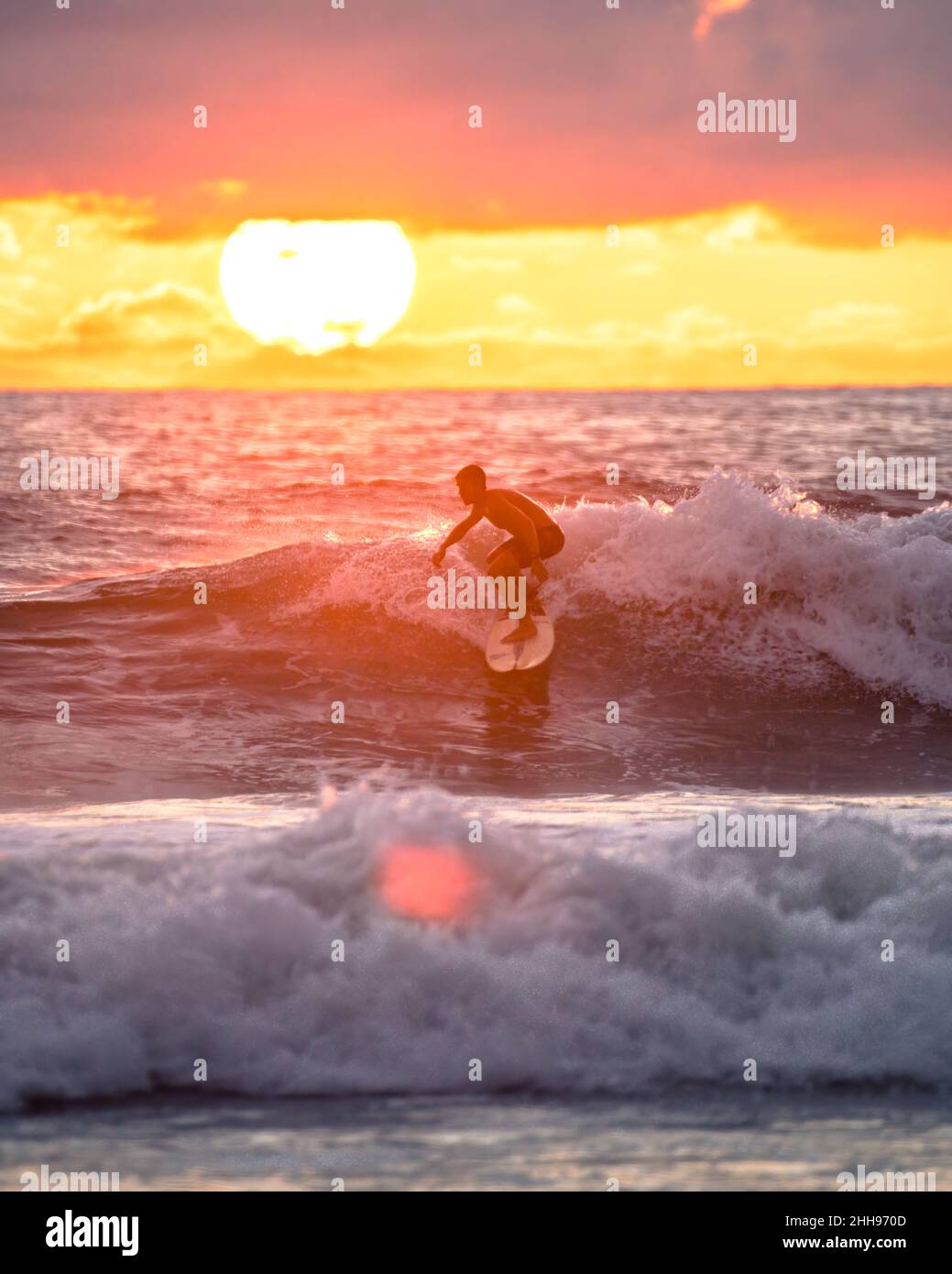 Taking waves and surfing, Pura vida Costa Rica Stock Photo
