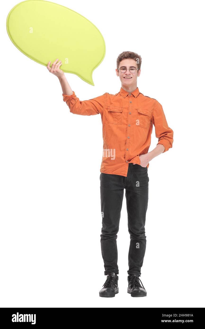 Attractive young man is holding a speech bubble, looking at camera and smiling Stock Photo