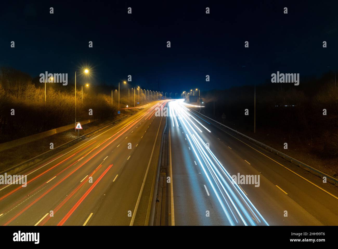 The M25 or London Orbital Motorway is a major road encircling most of Greater London, at night 