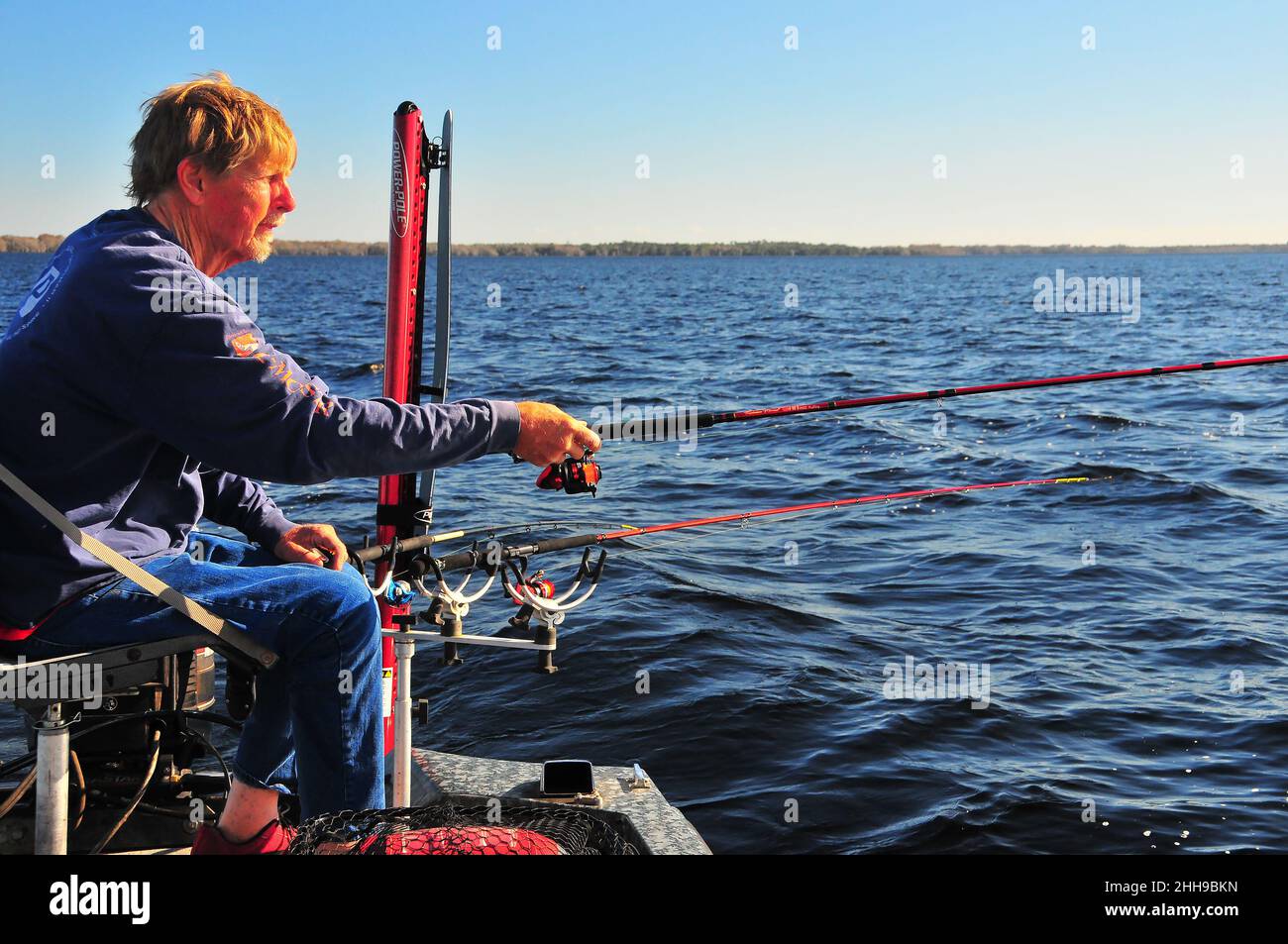 Guide Jack Smith fishes for crappie (speckled perch) from Central Florida waters..Electronics and PowerPoles are vital to successful crappie fishing. Stock Photo