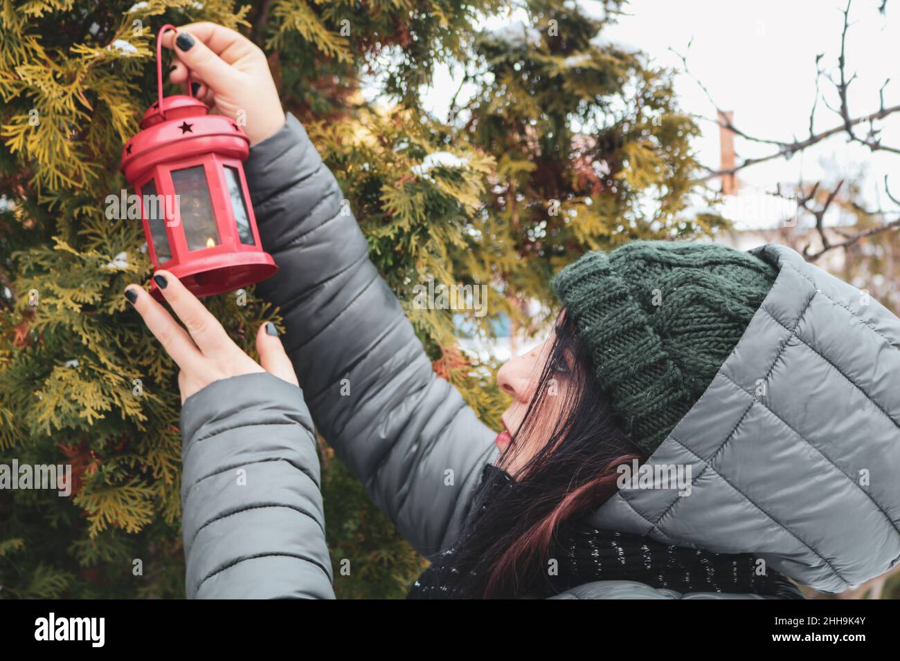 A girl with a red lantern Stock Photo