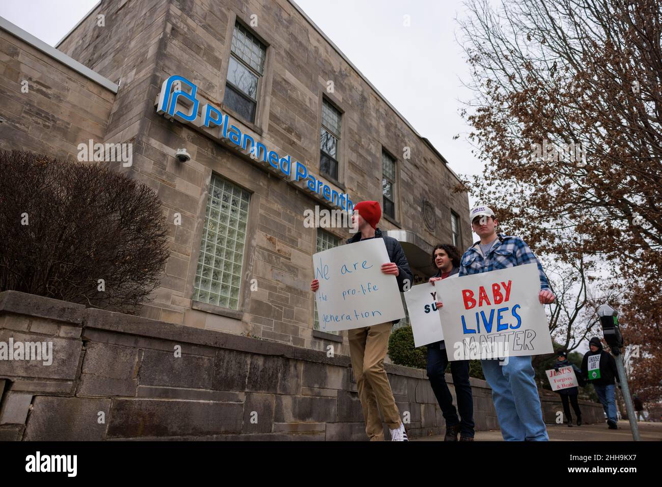 Anti-abortion protesters march past Planned Parenthood while holding signs during the Rally for Life in Bloomington. Indiana lawmakers are considering a law that would make it a felony to “coerce” a pregnant woman into having an abortion. The Supreme Court of the United States is also expected to hear cases that could overturn Roe v.s. Wade, a 1973 ruling that made abortion legal under the U.S. Constitution. (Photo by Jeremy Hogan / SOPA Images/Sipa USA) Stock Photo