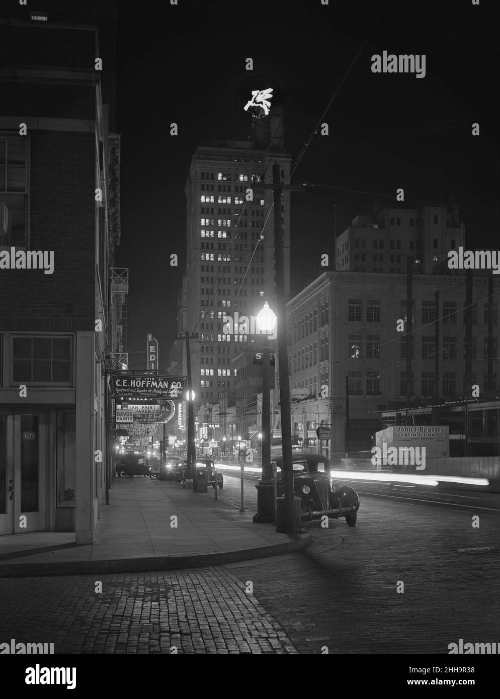 Commerce Street at Night, Dallas, Texas, USA, Arthur Rothstein, U.S. Office of War Information/U.S. Farm Security Administration, January 1942 Stock Photo
