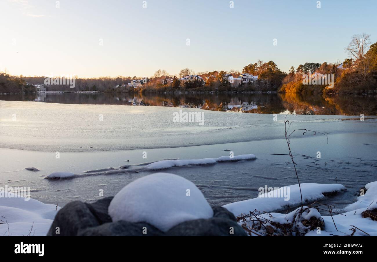 Partially frozen Cary Lake Park in North Carolina on a winter cold day