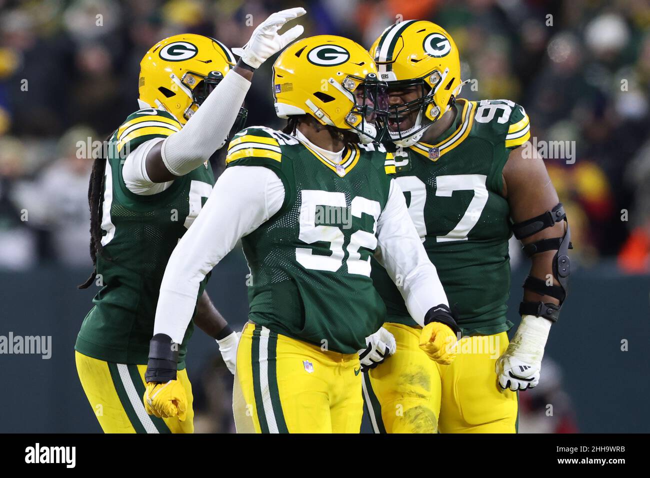 Green Bay, Wisconsin, USA. 22nd Jan, 2022. Green Bay Packers outside linebacker Rashan Gary (52) celebrates after his sack with nose tackle Kenny Clark (97) and inside linebacker De'Vondre Campbell (59) during the NFL divisional playoff football game between the San Francisco 49ers and the Green Bay Packers at Lambeau Field in Green Bay, Wisconsin. Darren Lee/CSM/Alamy Live News Stock Photo