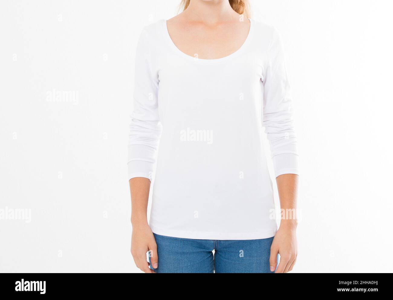 Midsection of young woman wearing blank tshirt on white background, girl in t-shirt mock up isolated Stock Photo