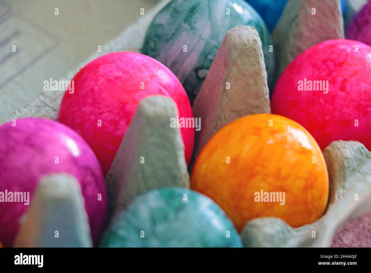 Out of focus. Multicolored Easter eggs, a symbol of a bright holiday Stock Photo