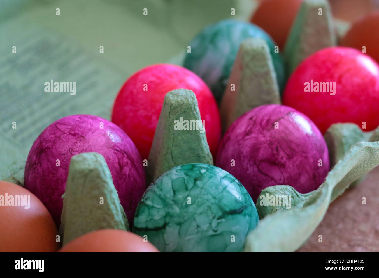 Out of focus. Multi-colored Easter eggs. A bright holiday for believers Stock Photo