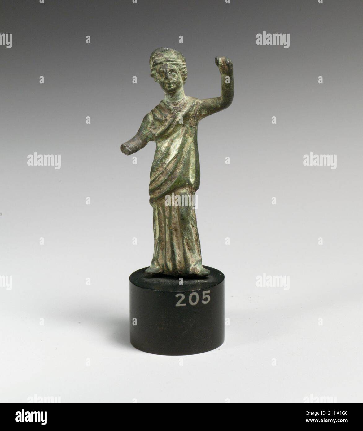 Bronze statuette of a goddess 1st–2nd century A.D. Roman The Roman goddess Juno is likely represented.. Bronze statuette of a goddess  246398 Stock Photo