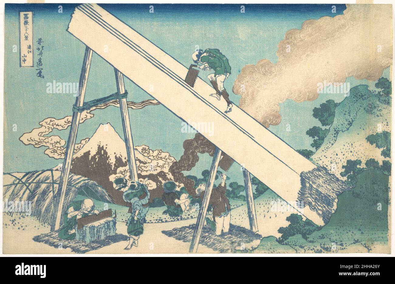 In the Mountains of Tōtomi Province (Tōtomi sanchū), from the series Thirty-six Views of Mount Fuji (Fugaku sanjūrokkei) ca. 1830–32 Katsushika Hokusai Japanese A massive inclined piece of lumber dominates the pictorial space of the print, and a small image of Mount Fuji is encapsulated in the frame of the raised support. Completely absorbed in cutting the trunk into planks, the lumbermen are unaffected by the magnificent vista beyond.. In the Mountains of Tōtomi Province (Tōtomi sanchū), from the series Thirty-six Views of Mount Fuji (Fugaku sanjūrokkei)  36506 Stock Photo