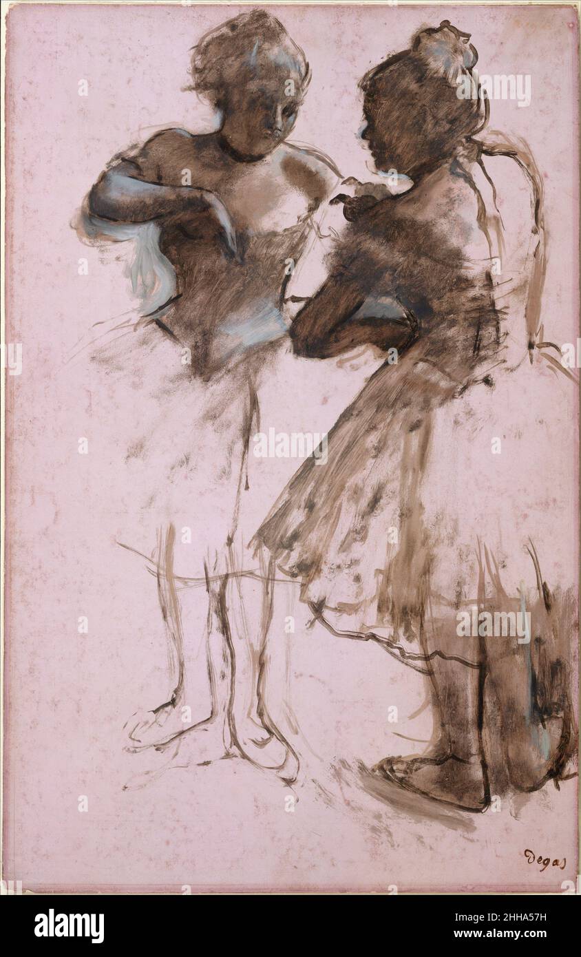 Two Dancers 1873 Edgar Degas French This freely brushed drawing belongs to the stock of figure studies Degas executed in sepia wash on colored papers for his great rehearsal pictures of the mid-1870s. The dancers are posed to the left and right of the ballet master in The Dance Class (Musée d'Orsay, Paris), begun in 1873, and the one at right also appears, looking into a mirror, in the Metropolitan's version of 1874 (1987.47.1).. Two Dancers. Edgar Degas (French, Paris 1834–1917 Paris). 1873. Dark brown wash and white gouache on bright pink commercially coated wove paper, now faded to pale pin Stock Photo