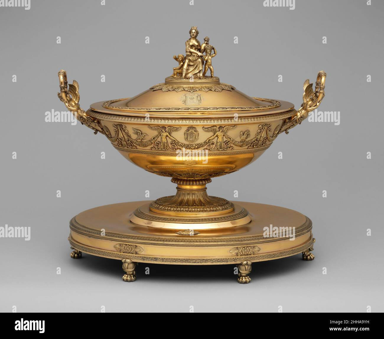 Tureen 1794–1814 Charles Percier French This tureen is part of a large table service reputedly given by Napoleon I to his sister Pauline and her husband, Prince Camillo Borghese.. Tureen. French, Paris. 1794–1814. Silver gilt. Metalwork-Silver Stock Photo