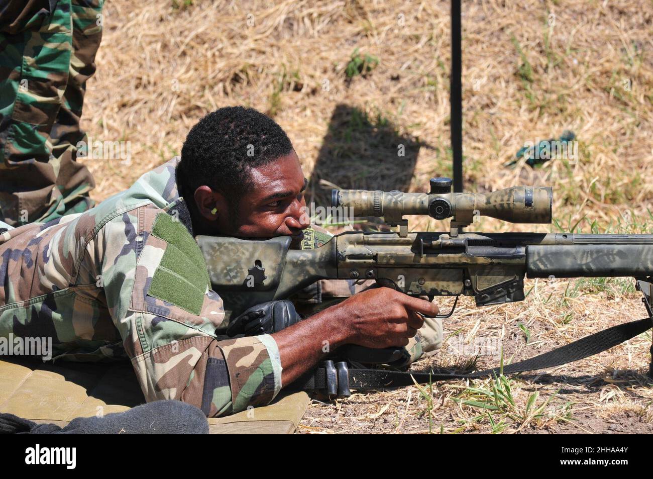 Snipers take aim during targets of opportunity event at Fuerzas Comando 2014. Stock Photo