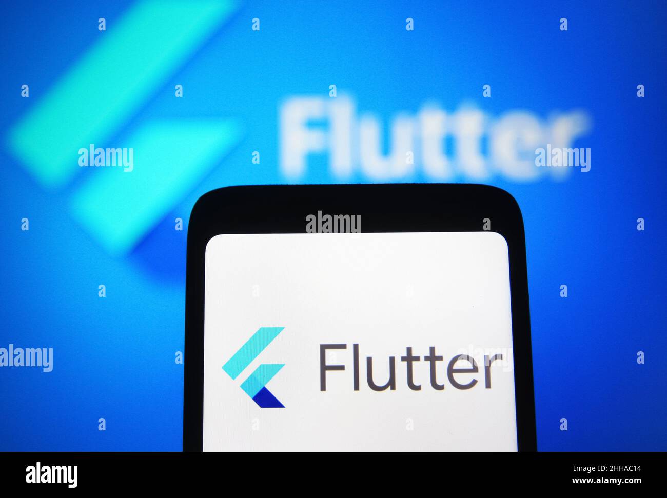 In this photo illustration, a Flutter logo is seen on a smartphone ...