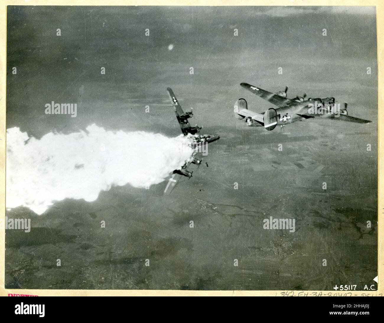 1944 - Consolidated B-24 Liberator breaking up. Photo by US Air Force. Stock Photo