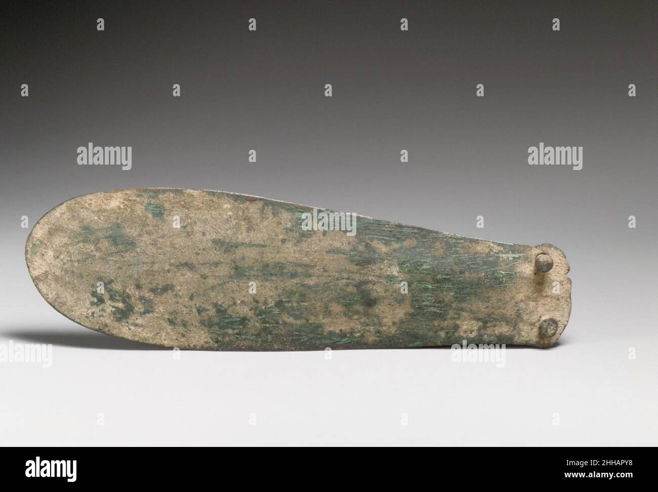 Bronze spatulate knife ca. 1600–1450 B.C. Minoan Dagger blade with two rivets.. Bronze spatulate knife  252406 Minoan, Bronze spatulate knife, ca. 1600?1450 B.C., Bronze, L. 8 3/8 in. (21.3 cm). The Metropolitan Museum of Art, New York. Bequest of Richard B. Seager, 1926 (26.31.486) Stock Photo