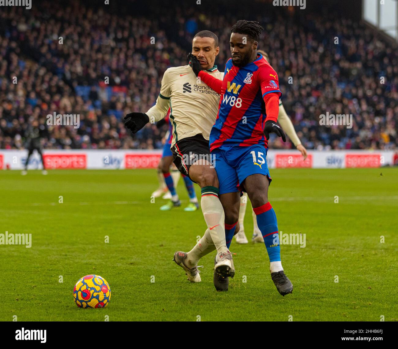 London, UK. 24th Jan, 2022. Liverpool's Joel Matip (L) challenges Crystal Palace's Jeffrey Schlupp during the English Premier League match between Crystal Palace and Liverpool in London, Britain, on Jan. 23, 2022. Credit: Xinhua/Alamy Live News Stock Photo